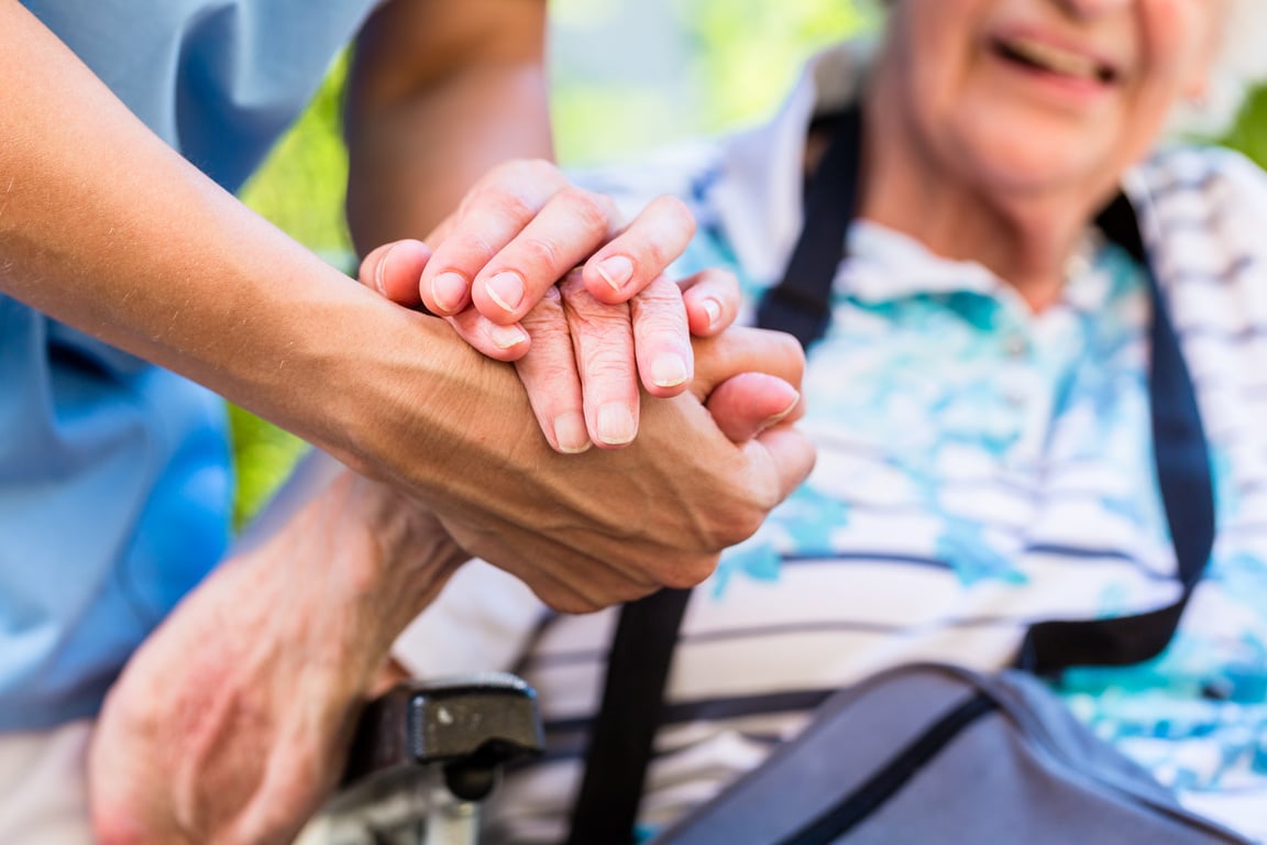 Nurse Consoling Senior  